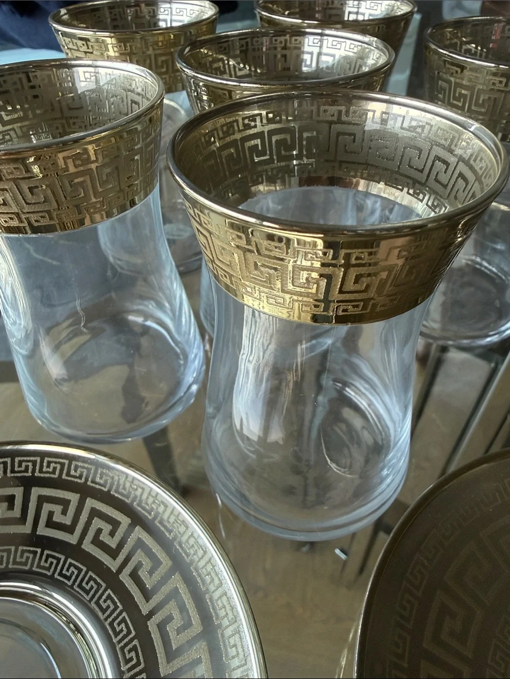 Clear Glass Tea Cup and Saucer Set with Gold Greek Key Accent